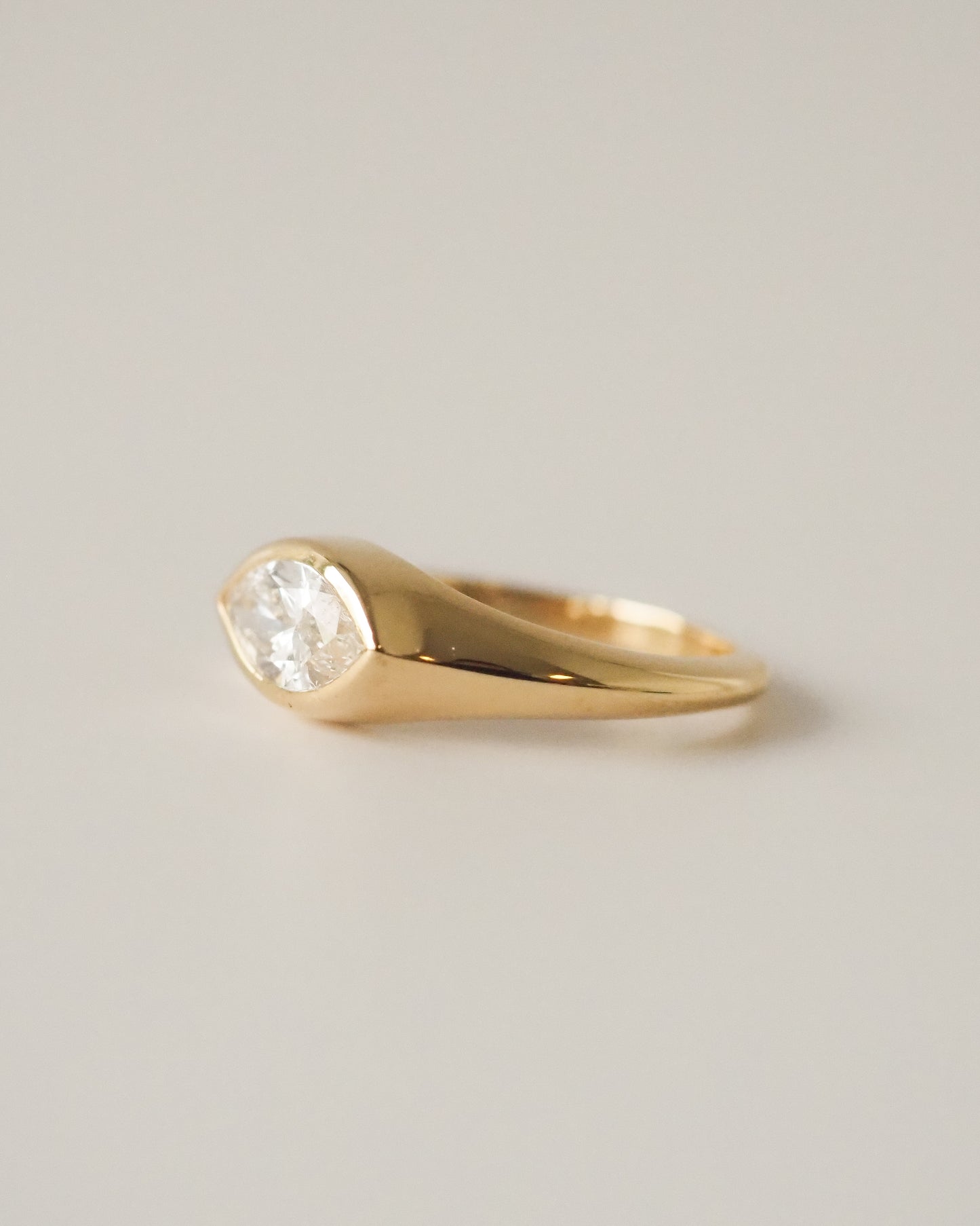 Marquise bezel east-west ring